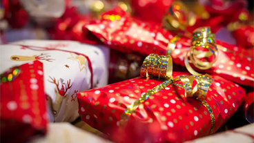 red and white wrapped christmas gifts for secret santa exchange