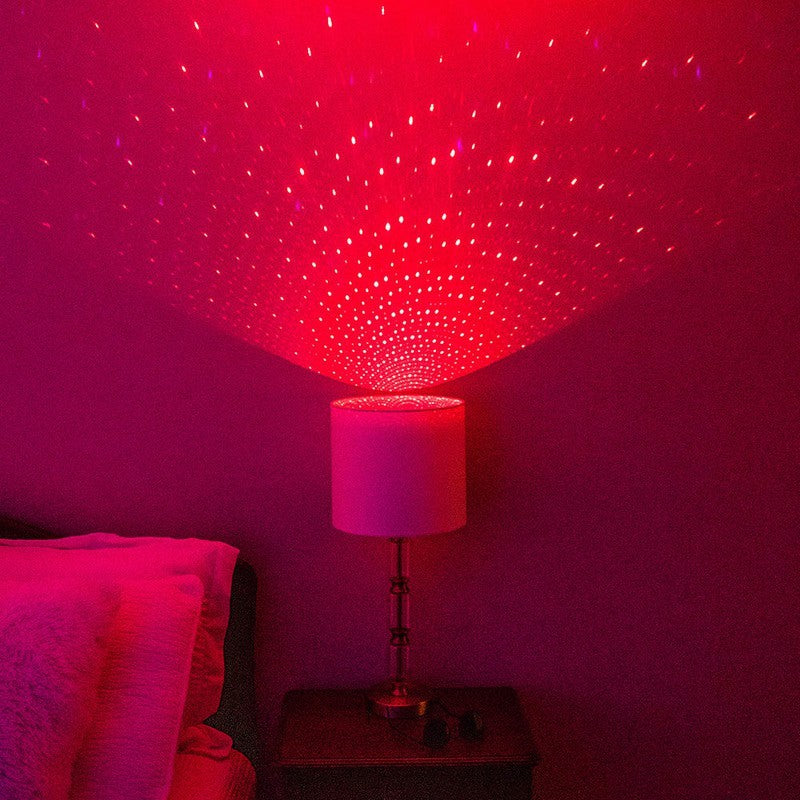 lamp with blissbulb in red, star light bulb, shines thousands of colorful laser stars