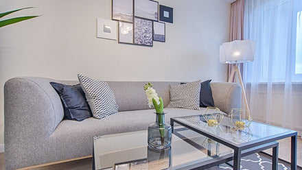 living room with blue and grey decor