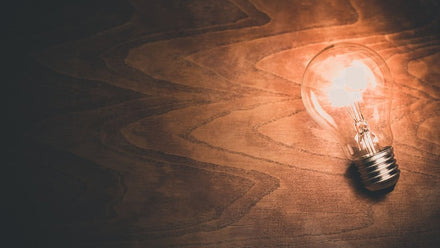 lightbulb on wood background