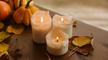 candles with autumn decor
