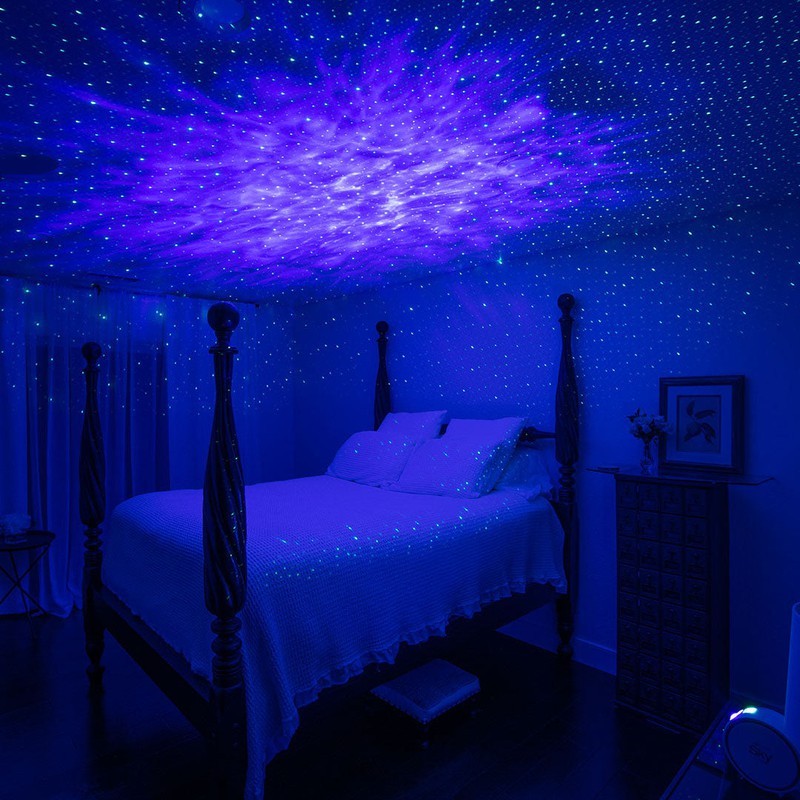 bedroom with sky lite galaxy projector shining on ceiling