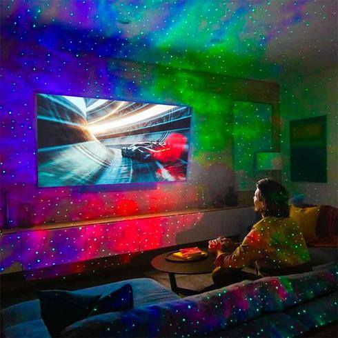 man playing video games with sky lite 2.0 multicolor galaxy light